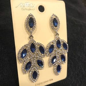 Jeweled earrings and rhinestone hair comb